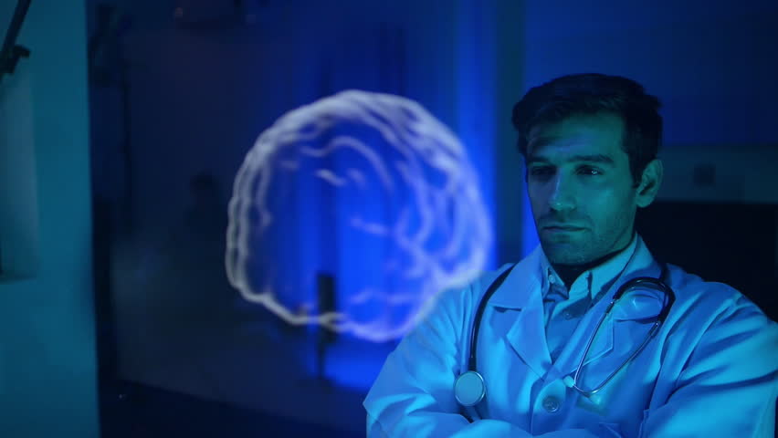 Doctors analysis for brain with futuristic hologram technology before surgery  in a modern hospital setting - Powered by Shutterstock - Get 15% off with code: PIKWIZARD15
