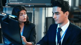 Diverse business professionals collaborating in a modern office, focused on digital technology, data analysis, and corporate success. Ideal for concepts of teamwork, finance, and career. - Powered by Shutterstock - Get 15% off with code: PIKWIZARD15