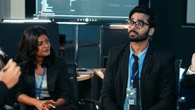 Multicultural professionals developer team reviewing work, collaborating on a digital project, and actively engaging in a modern tech office. Teamwork, data analysis, and corporate success. - Powered by Shutterstock - Get 15% off with code: PIKWIZARD15