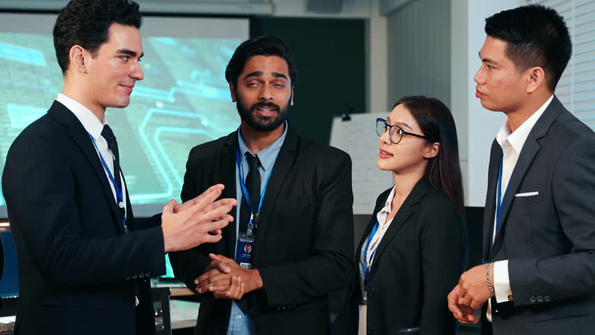 Diverse group of business professionals are networking and discussing a digital strategy in a modern office. Consulting future innovation. Brainstorming project with team developer - Powered by Shutterstock - Get 15% off with code: PIKWIZARD15