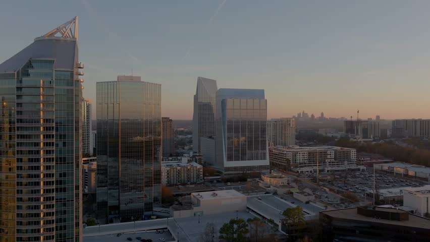Buckhead uptown commercial and residential district of Atlanta at sunset, Georgia, Drone shot, Establishing