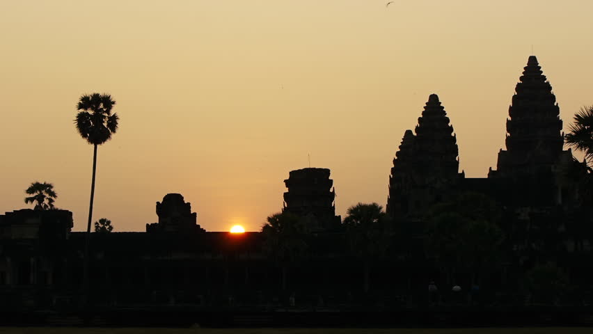 Sun rises over ruins of Angkor Wat