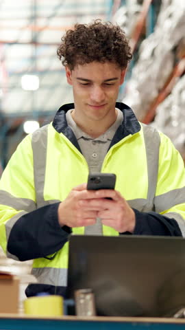 Logistics, worker and typing with phone in warehouse, online schedule or texting for package storage info. Laptop, notification or man with mobile app for team group chat, shipping agenda and message