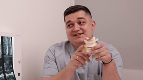 vertebrae model, medical scrubs, spine health. Healthcare provider in scrubs utilizes vertebrae model to demonstrate spinal anatomy and discuss health with patient during consultation. - Powered by Shutterstock - Get 15% off with code: PIKWIZARD15