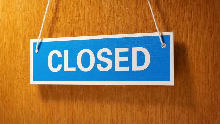 Closed Sign On Door Moving Shot