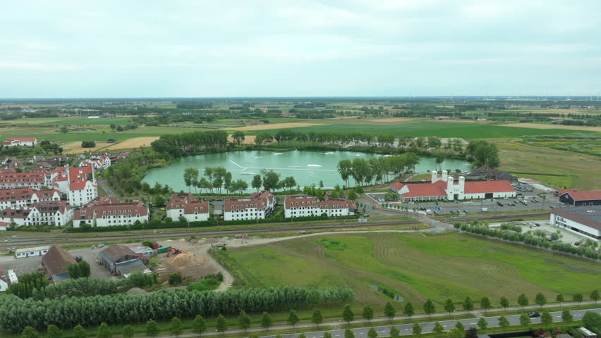Duinenwater Wake Board Cable Park in Knokke - Aerial View Dolly In