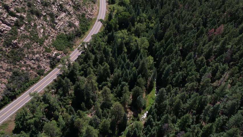 Aerial View of Mountain Pass in Landscape of Colorado USA. Frontier Pathways Scenic and Historic Byway Road, Revealing Drone Shot