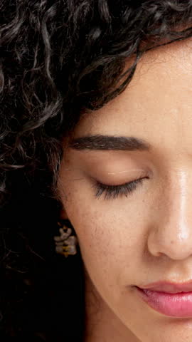 Skincare, half face and beauty with woman in studio for self care, aesthetic and eyes. Dermatology, shine and hydration with portrait of female person for collagen, retinol and freckles closeup