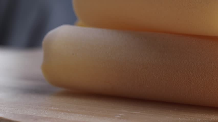 Raw Italian spanish Cannelloni Pasta in supermarket texture close up. Cooking background. Italian food concept.