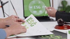 Collaborative esg strategy meeting corporate office presentation materials professional environment close-up view sustainability concepts - Powered by Shutterstock - Get 15% off with code: PIKWIZARD15