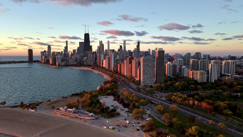 aerial push in at sunrise to Chicago Illinois Skyline