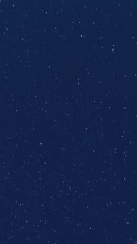 Time‑lapse of the Milky Way and moonrise over a majestic mountain landscape at night, revealing stars, galaxies and shifting light in a tranquil, awe‑inspiring natural scene.