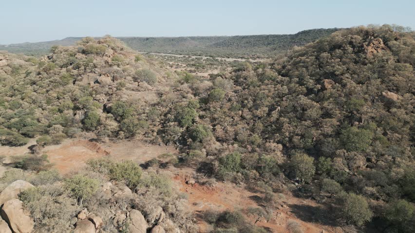 aerial view, African landscape typical Southern African region ,mountain range, savannah bush with acacia trees, shrubs and sand