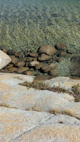 Clear clean water in Tenaya Lake, located in Yosemite, it is the largest lake in Yosemite