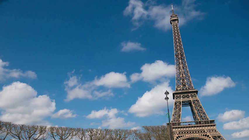 close up view of Paris Eiffel Tower Tour de Eiffel. Famous and tall Eiffel Tower as background. Famous landmark in France. Popular European city honeymoon destination.