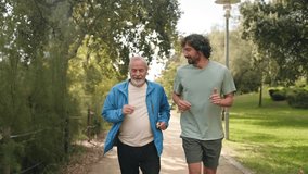 Happy senior father and son jogging doing sport together, running for healthy lifestyle and family bonding - Powered by Shutterstock - Get 15% off with code: PIKWIZARD15