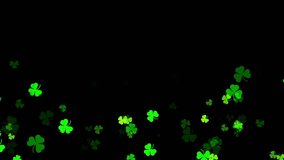 4K Shamrock falling on the ground Green clover leaves on black background St Patrick's day animation - Powered by Shutterstock - Get 15% off with code: PIKWIZARD15