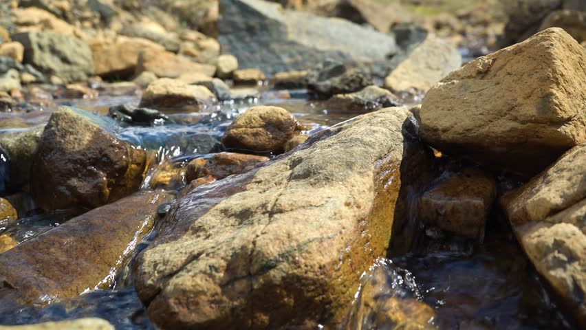 Newfoundland Tablelands Mountains With Rocky Stream