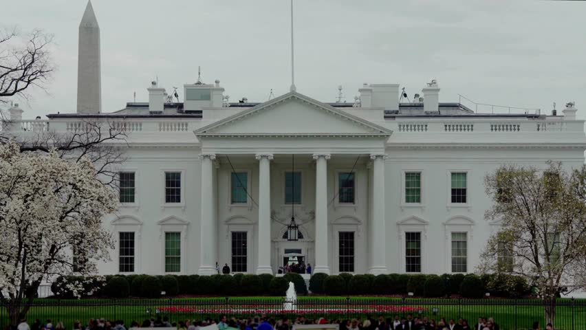 The White House and dark sky Washington DC, United States of America, North America White House In Washington D.C. With Tourists politic