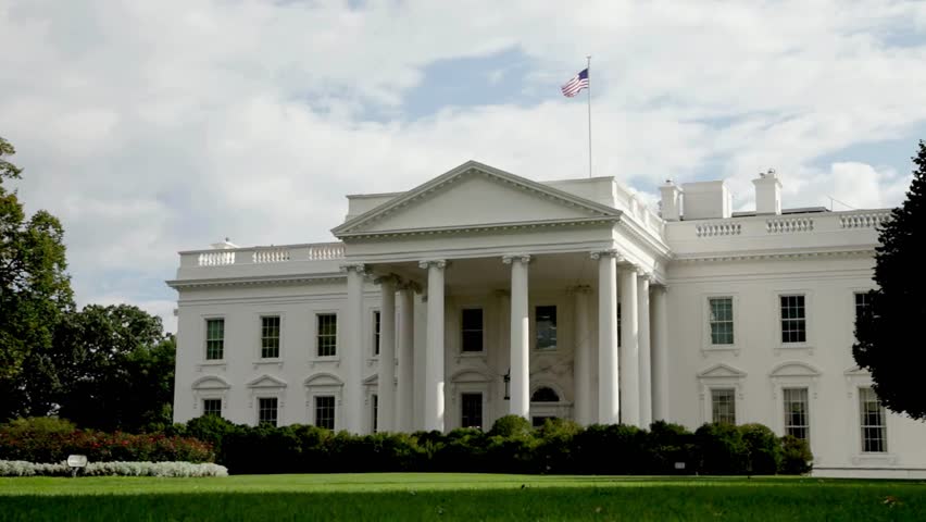 The White House in Washington DC beautiful day closeup of the lawn Presidential residence President United States of America on a summer day.