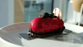 Halloween cakes are a dessert of the autumn holiday Halloween. red Halloween cake Coffin-Shaped Cookie with a Red Cross, Looping Rotation. Isolated on Black, Halloween Holiday Theme. - Powered by Shutterstock - Get 15% off with code: PIKWIZARD15