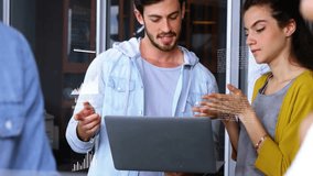 Man introducing data on laptop triggers AR bar charts and line graphs for business analysis. Collaboration, innovation, futuristic, analytics, digital, office, professional - Powered by Shutterstock - Get 15% off with code: PIKWIZARD15