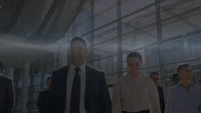 Corporate team walking through lobby activating floating data rings and streaming code around them. Business, innovation, technology, collaboration, futuristic, professionalism, networking - Powered by Shutterstock - Get 15% off with code: PIKWIZARD15