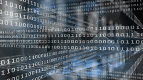 Binary code streaming on desk, data analyst typing, scrolling, reviewing results as overlay dimming. Technology, digital, programmer, data, innovation, futuristic, modern - Powered by Shutterstock - Get 15% off with code: PIKWIZARD15