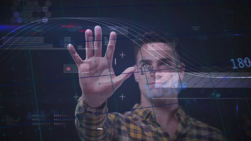 Adult man raising right hand at interface scanning data analyzing and tracking graphs in technology. Virtual reality, interface, data, digitalization, innovation, futuristic, technology - Powered by Shutterstock - Get 15% off with code: PIKWIZARD15