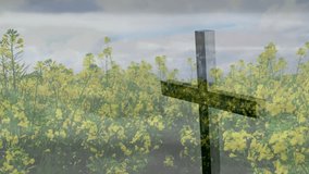 Cloudy sky muted orange glow appearing at horizon sun rising behind wood cross illuminating flowers. Spiritual, sunrise, nature, silhouette, tranquility, pastoral, dawn - Powered by Shutterstock - Get 15% off with code: PIKWIZARD15