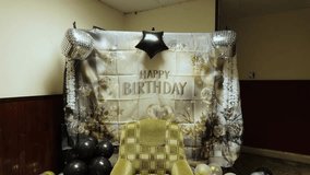 Festive interior scene with balloons gold black and silver happy birthday wall - Powered by Shutterstock - Get 15% off with code: PIKWIZARD15