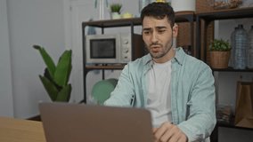 Man expressing frustration during video call in office setting with modern decor and plants. - Powered by Shutterstock - Get 15% off with code: PIKWIZARD15