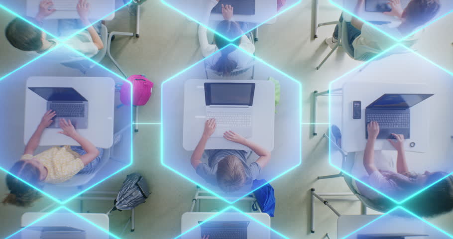 Schoolchildren Work on Laptops at Individual Desks, Visually Connected Via Digital Light Network. Concept of Combined Digital Learning, Technology Integration, Future Oriented Learning. Top View.