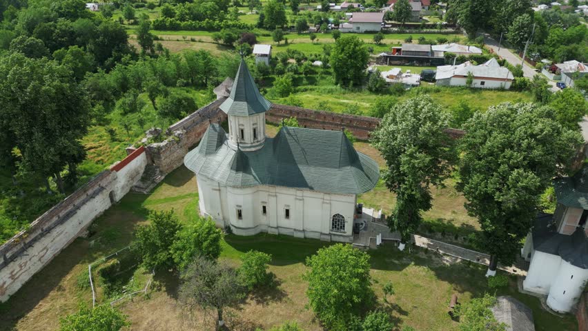 Mera Monastery With Picturesque Forest Mountains In Vrancea County, Romania. Aerial Tilt-up Shot