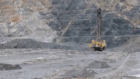 Drill rigs machine for drilling rock for explosives installation, quarry ore mining. - Powered by Shutterstock - Get 15% off with code: PIKWIZARD15