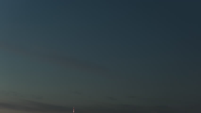Nighttime View of New York City Skyline Featuring Iconic Skyscrapers