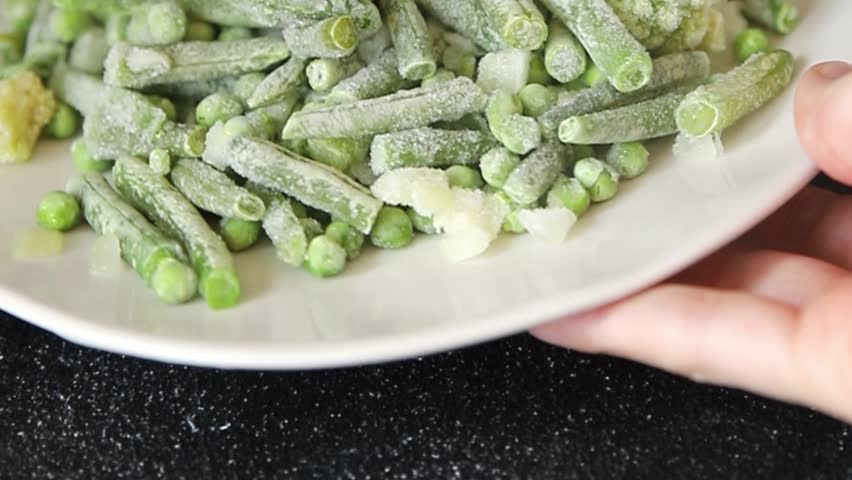 Green vegetables frozen food green peas, broccoli, string beans, kohlrabi kale tasty snack fresh food background on the table rustic food top view copy space keto and paleo diet vegan vegetarian 