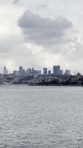 Istanbul, Turkey. Scenic view of the Bosphorus Strait with city view in the background. Urban skyline and city life.	