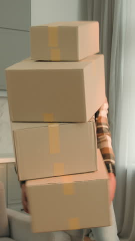 African American man with many boxes crash into couch sofa falling drop parcels ethnic male guy carry heavy goods buying stuff for new home flat disappointed worried internet shopping moving orders