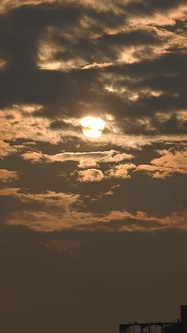 A beautiful sunset scene with dark cloud and birds 