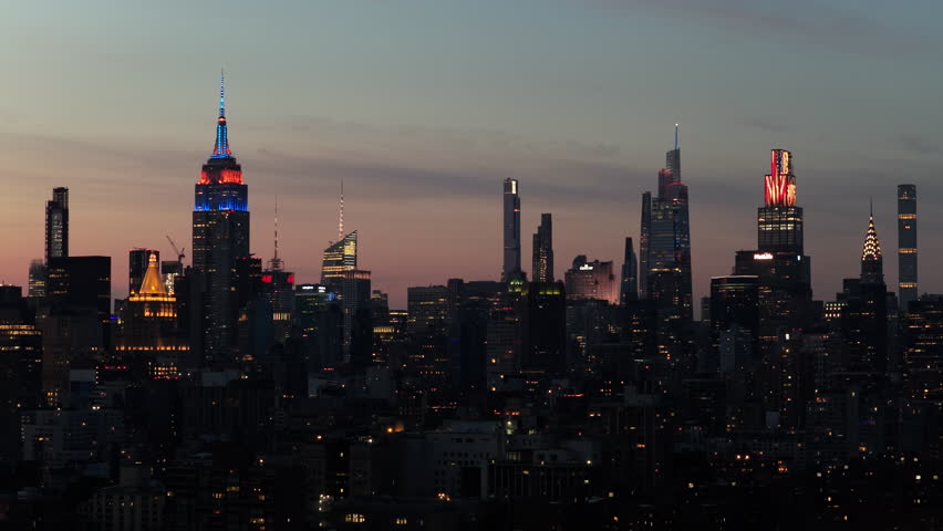Evening Illumination of New York City's Iconic Skyscrapers Feat. Empire State Building and One World Trade Center