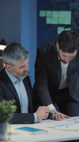 A Strategic Business Planning Meeting Taking Place Among Executives in a Modern Office Environment