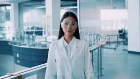 Millennial Asian woman scientist in laboratory during pandemic research - Powered by Shutterstock - Get 15% off with code: PIKWIZARD15