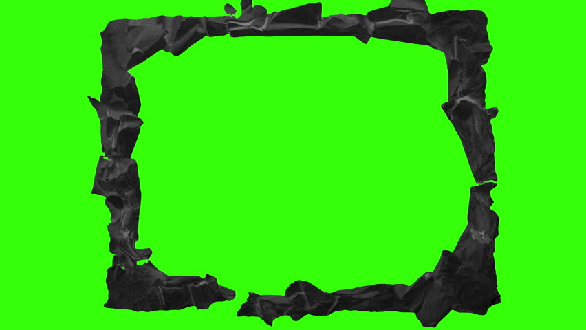 Stop motion animation of ripped black crumpled craft paper revealing a green screen hole. Perfect for creative title transitions, intros, or visual effects in handmade organic style.