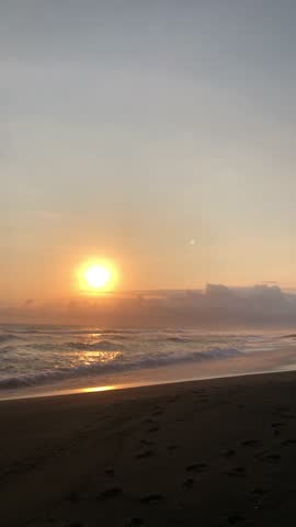 Sunset on a black sand beach