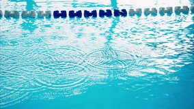Calm and Rippling Waters: A Close-Up Exploration of Reflections and Patterns in a Tranquil Swimming Pool Environment - Powered by Shutterstock - Get 15% off with code: PIKWIZARD15
