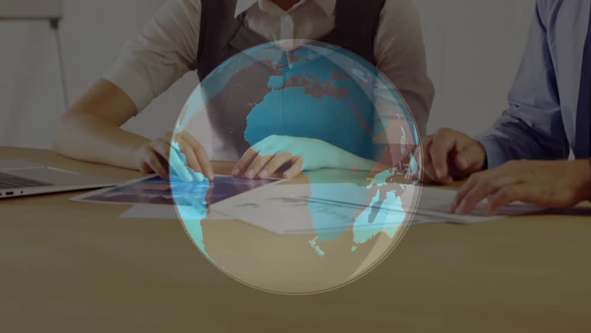 Female colleague tapping tablet activating 3D globe while gesturing chart data for market analysis. Business, collaboration, data, analysis, strategy, professional, teamwork - Powered by Shutterstock - Get 15% off with code: PIKWIZARD15