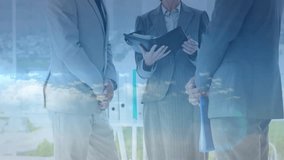 Colleagues opening folder and discussing finance, animating currency globe showing market trends. Corporate, teamwork, urban, professionalism, modern, strategy, innovation - Powered by Shutterstock - Get 15% off with code: PIKWIZARD15