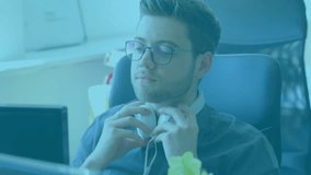 Adult male grabbing headphones and adjusting headband while monitoring tech data charts on monitor. Electronics, concentration, modern, workspace, technology, analysis, professional - Powered by Shutterstock - Get 15% off with code: PIKWIZARD15