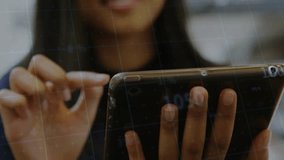 Office pro tapping tablet and activating green yellow line graphs with updating finance data. Technology, data visualization, financial analysis, business, innovation, digital, chart - Powered by Shutterstock - Get 15% off with code: PIKWIZARD15